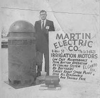 Founder, Charles Martin, standing next to a Vertical Irrigation Motor, circa 1964.